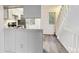 Charming kitchen with ample counter space, modern appliances, and an open view to the staircase at 1699 S Trenton St # 174, Denver, CO 80231