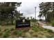 Welcoming entrance to Long's Pine Grove in Arapahoe County Open Spaces, featuring lush greenery at 1699 S Trenton St # 174, Denver, CO 80231