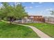 Inviting pool area with lounge chairs and a shaded pergola, perfect for relaxation and outdoor entertaining at 1699 S Trenton St # 174, Denver, CO 80231