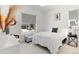 Inviting bedroom with warm sunlight, neutral tones, and a comfortable bed at 11383 Autumn Moon St, Littleton, CO 80125