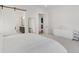 Comfortable bedroom with bathroom en suite, dresser and mirror at 11383 Autumn Moon St, Littleton, CO 80125