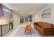 Finished basement with a comfortable lounge area, laundry area and bright lighting at 421 Elati St, Denver, CO 80204