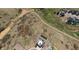 Stunning aerial view of property, situated on a sprawling lot with open space and mountain views at 3128 Bivouac Pt, Castle Rock, CO 80108