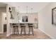 Chic bar area with seating, perfect for entertaining and relaxation at 3128 Bivouac Pt, Castle Rock, CO 80108