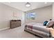 This bedroom features a bright interior, a dresser and a cozy-looking bed at 3128 Bivouac Pt, Castle Rock, CO 80108