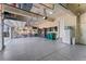 An organized garage features epoxy floors, storage cabinets, and space for bikes and tools at 3128 Bivouac Pt, Castle Rock, CO 80108