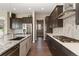 Gourmet kitchen boasts stainless steel appliances, modern cabinetry, and granite countertops at 3128 Bivouac Pt, Castle Rock, CO 80108