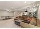 The spacious living room features a large couch, media projector, and a ping pong table at 3128 Bivouac Pt, Castle Rock, CO 80108