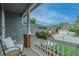 Cozy porch featuring comfortable chairs, and flowers offering a relaxing outdoor space at 9884 Sydney Ln, Highlands Ranch, CO 80130