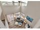 Bright living room featuring a ceiling fan, cozy furniture, and patio access, ideal for relaxation at 9884 Sydney Ln, Highlands Ranch, CO 80130