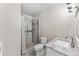 Clean bathroom with a walk-in shower, granite vanity, and modern fixtures at 595 S Alton Way # 5D, Denver, CO 80247