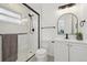 Nicely remodeled bathroom featuring subway tile in the shower and modern fixtures at 2120 Oak Pl, Thornton, CO 80229