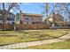 Large backyard with a tall wood fence and trees at 8737 Garrison Ct, Arvada, CO 80005