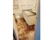This bathroom features a granite countertop, white cabinets, and a tiled floor at 2355 E Geddes Ave # G24, Centennial, CO 80122