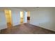 Carpeted bedroom with connected rooms at 2355 E Geddes Ave # G24, Centennial, CO 80122