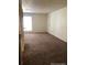 Spacious living room featuring neutral walls and plush carpeting at 2355 E Geddes Ave # G24, Centennial, CO 80122