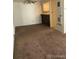 Spacious living room with neutral walls and carpet at 2355 E Geddes Ave # G24, Centennial, CO 80122