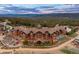 Luxury ski resort with multiple buildings, outdoor seating, and mountain views at 1521 Ski Hill Rd # 8313, Breckenridge, CO 80424