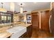 Bright kitchen with stainless appliances, granite counters, undermount sink and an open view of living spaces at 1521 Ski Hill Rd # 8313, Breckenridge, CO 80424
