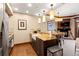 Modern kitchen with granite countertops, stainless steel appliances, and eat-in breakfast bar at 1521 Ski Hill Rd # 8313, Breckenridge, CO 80424