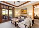 Cozy living room featuring comfortable sofa, balcony access, and natural light at 1521 Ski Hill Rd # 8313, Breckenridge, CO 80424