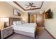 Comfortable bedroom with ceiling fan, art, and good natural light with convenient access to other rooms at 1521 Ski Hill Rd # 8313, Breckenridge, CO 80424