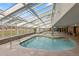 Indoor pool area with natural light, various pool depths, and comfortable lounging space at 1521 Ski Hill Rd # 8313, Breckenridge, CO 80424