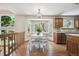 Inviting dining area next to the kitchen with natural light from the bay window at 8229 S Ogden Cir, Littleton, CO 80122