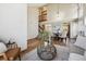 Spacious open-concept home featuring hardwood floors and an inviting staircase at 8229 S Ogden Cir, Littleton, CO 80122