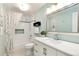 Charming bathroom features a bathtub, vanity, and modern decor, creating a relaxing and stylish space at 6474 W Canyon Ave, Littleton, CO 80128