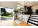 Open living space with patio access and modern railing at 6474 W Canyon Ave, Littleton, CO 80128