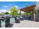 Covered patio with pool, grill, table and chairs at 6474 W Canyon Ave, Littleton, CO 80128