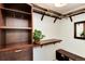 Spacious walk-in closet with built-in shelving, a bench, and a mirror for optimal organization and style at 6474 W Canyon Ave, Littleton, CO 80128