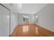 Bedroom featuring a large window, hardwood floors, a skylight and a double-wide closet at 1818 S Quebec Way # 7-8, Denver, CO 80231