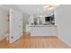 Open dining area with view of the kitchen at 1818 S Quebec Way # 7-8, Denver, CO 80231
