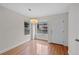 Bright dining room with natural light and hardwood floors at 1818 S Quebec Way # 7-8, Denver, CO 80231