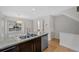 Updated kitchen featuring stainless steel appliances and a granite countertop island at 1818 S Quebec Way # 7-8, Denver, CO 80231