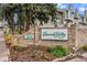 Community signage for Emerald Valley featuring brick surround at 1818 S Quebec Way # 7-8, Denver, CO 80231