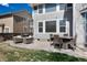 Outdoor patio with comfortable seating and a dining area for relaxing and entertaining at 16240 E 119Th Ave, Commerce City, CO 80022