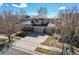 Two-story home features an attached three-car garage and neutral-colored siding at 16240 E 119Th Ave, Commerce City, CO 80022