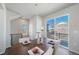 Bright dining room with sliding glass doors leading to a deck at 22042 E 38Th Pl, Aurora, CO 80019