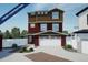 Two-story home with attached garage and landscaping at 22042 E 38Th Pl, Aurora, CO 80019