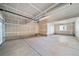 Spacious garage with high ceilings and extra storage at 22042 E 38Th Pl, Aurora, CO 80019