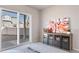 Home office with sliding glass door to backyard at 22042 E 38Th Pl, Aurora, CO 80019