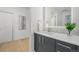 Contemporary bathroom with hardwood floors and modern vanity at 2530 Lawrence St # Ra301, Denver, CO 80205