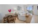 Airy living room featuring hardwood floors, neutral furniture, and lots of natural light at 2530 Lawrence St # Ra301, Denver, CO 80205
