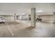 Well-lit parking garage with reserved parking spaces at 2530 Lawrence St # Ra301, Denver, CO 80205