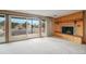 Spacious basement room with fireplace and sliding doors at 18585 Augusta Dr, Monument, CO 80132