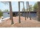 Ranch style home with gray siding, red door and attached two-car garage at 18585 Augusta Dr, Monument, CO 80132