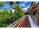 Exterior backyard with beautiful landscaping, a wooden fence and vibrant greenery at 581 Stonemont Dr, Castle Pines, CO 80108